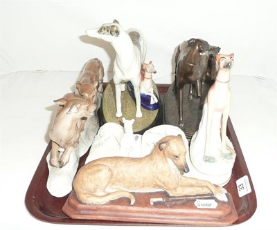 Lot 33 - Two Staffordshire greyhounds and five other greyhound figures