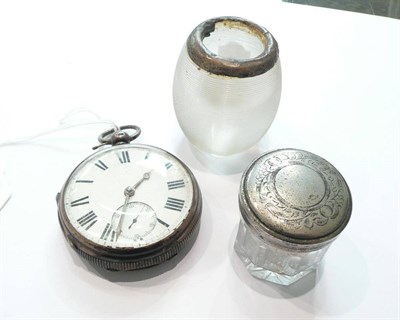 Lot 55 - Silver cased pocket watch, silver-mounted match striker and two silver-topped glass bottles