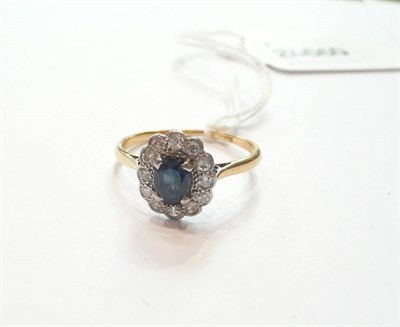 Lot 60 - Sapphire and diamond ring