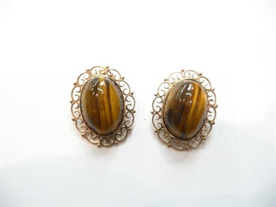 Lot 62 - Tiger's eye and gold ear clips