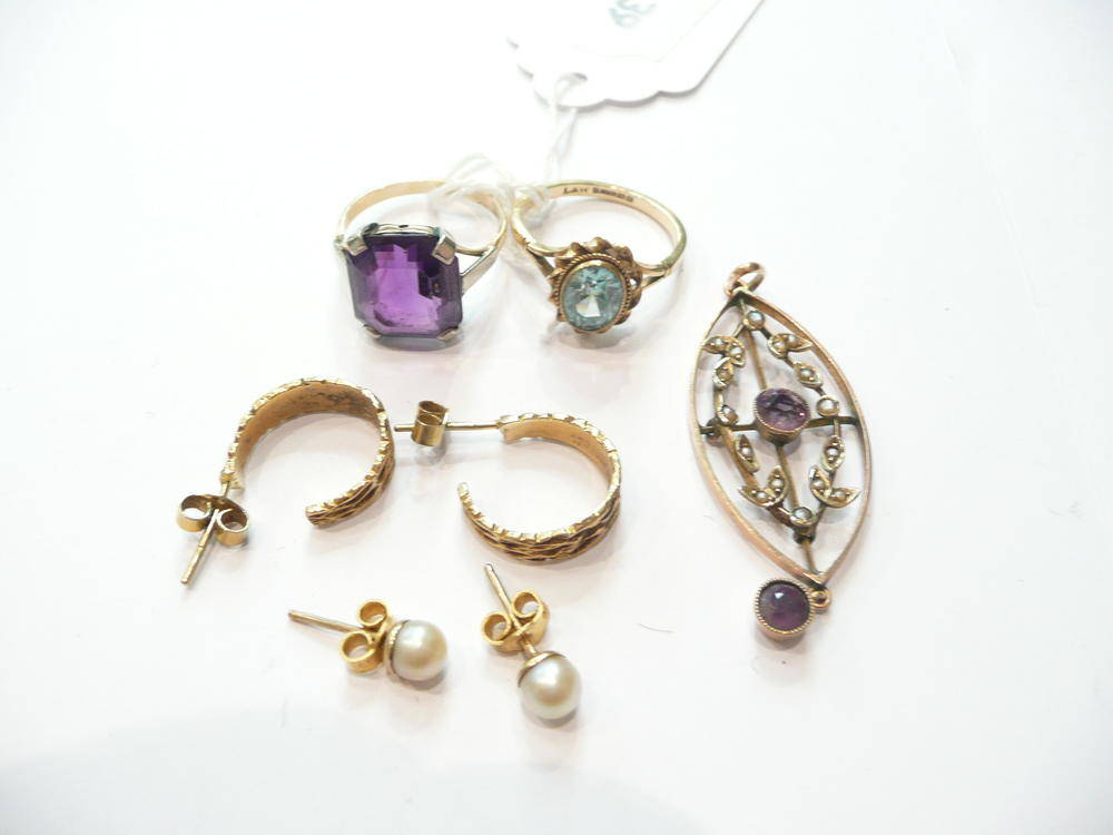 Lot 63 - An amethyst and seed pearl pendant, two dress rings and two pairs of earrings