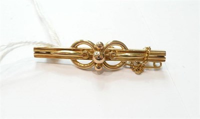 Lot 87 - A cased bar brooch, stamped 15ct