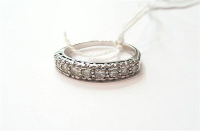 Lot 90 - A diamond half eternity ring