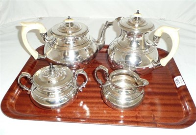 Lot 158 - A four piece silver teaset (4)