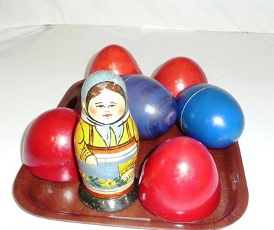 Lot 163 - A Russian wooden doll and two Russian eggs