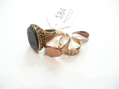 Lot 184 - Four 9ct gold signet rings, one set with a carved bloodstone