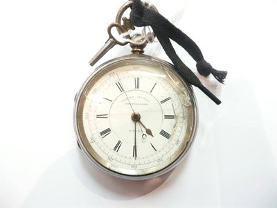 Lot 211 - A silver cased chronograph and key