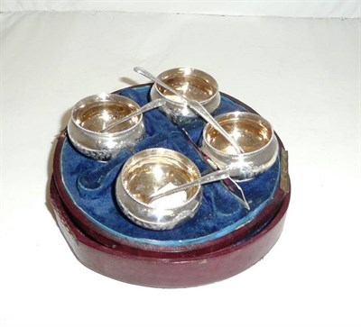 Lot 222 - Cased set of four silver salts with spoons