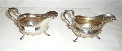 Lot 239 - Pair of Georgian silver sauce boats