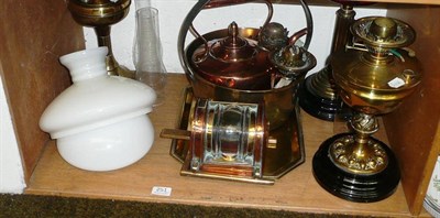 Lot 251 - A quantity of copper and brass including oil lamps, warming pan, preserve pan, marine lamp, kettle