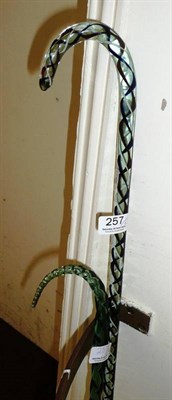 Lot 257 - Two glass walking canes (2)