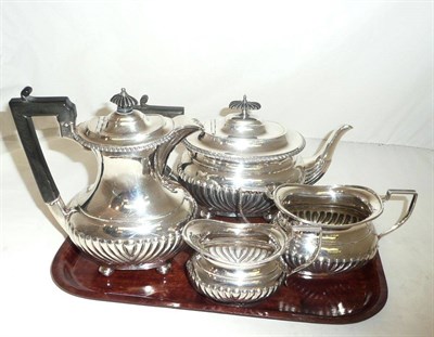 Lot 275 - A four piece silver tea set