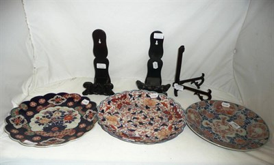 Lot 286 - Three Imari dishes and stands