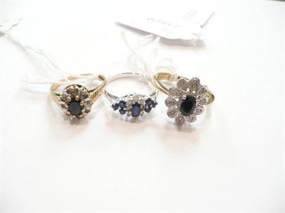 Lot 323 - Three sapphire and diamond rings (3)