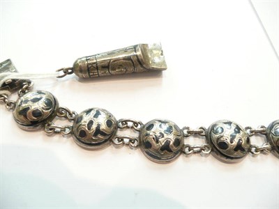 Lot 325 - A Niello silver bracelet and a Russian whistle