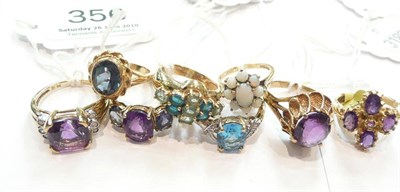 Lot 356 - Eight dress rings (8)