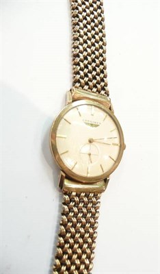 Lot 359 - A 9ct gold gents wristwatch signed Longines in a Longines box