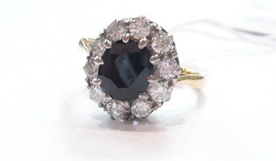 Lot 366 - Sapphire and diamond ring