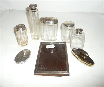 Lot 377 - Quantity of silver mounted dressing table bottles and a silver photograph frame