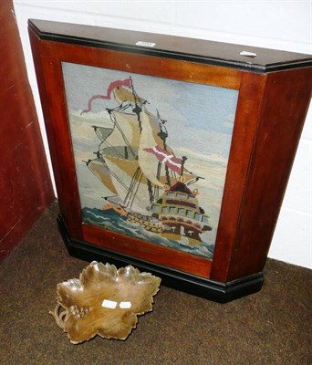 Lot 390 - Swiss musical grape leaf dish and a tapestry ship mounted in a mahogany and ebonised cover