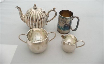 Lot 402 - Late Victorian silver teapot, christening mug, plain sugar basin and cream jug, approx. 17.75ozs