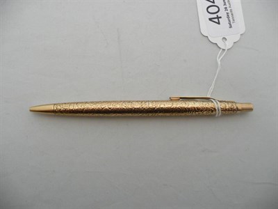 Lot 404 - A 9ct gold pen