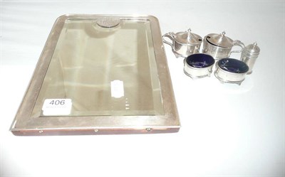 Lot 406 - A silver five piece cruet set and  a plated rectangular mirror