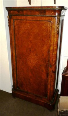 Lot 517 - Victorian walnut ormolu mounted floor standing cupboard