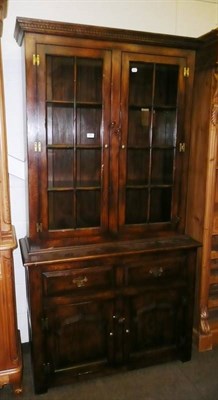 Lot 523 - Reproduction oak bookcase cabinet