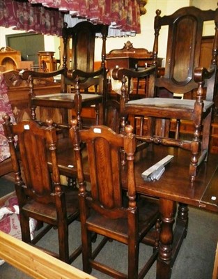 Lot 552 - Oak refectory table and six chairs