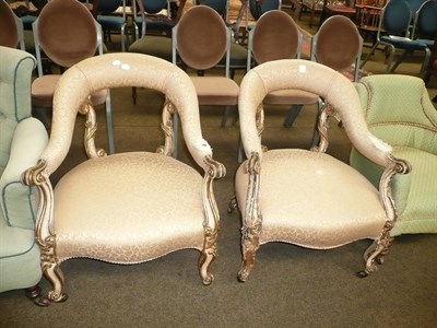 Lot 598 - A pair of gilt decorated open armchairs