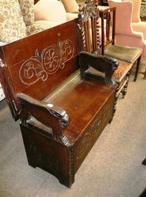 Lot 604 - Oak monk's bench, carved oak chair and an Edwardian inlaid mahogany bedroom chair