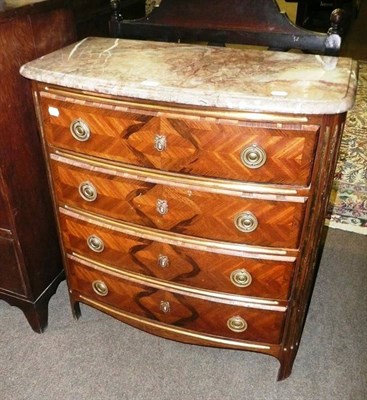 Lot 624 - A Continental oak marble-topped chest of drawers