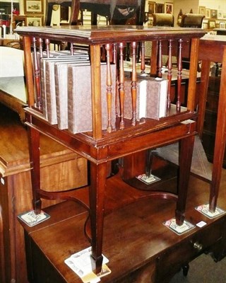 Lot 639 - Edwardian revolving book stand and books