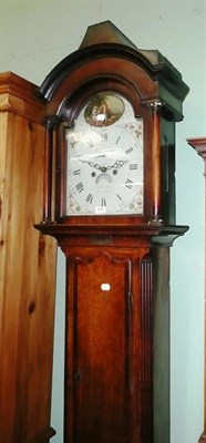 Lot 656 - Eight day painted dial oak longcase clock signed 'Skelton, Malton'