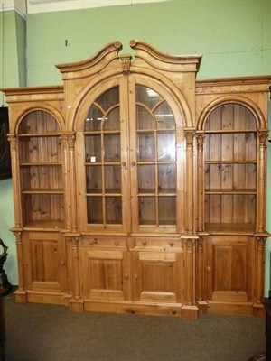 Lot 657 - George III style pine breakfront bookcase