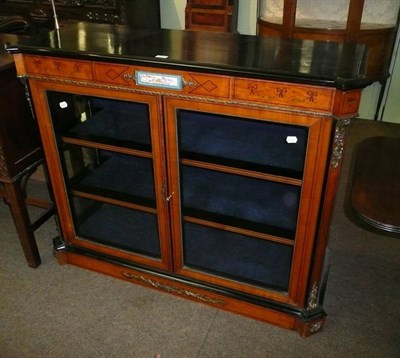 Lot 661 - 19th century ebonised and satinwood glazed cabinet