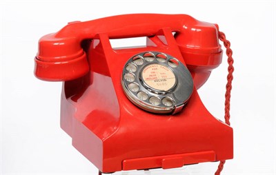 Lot 1009 - A Type 332L Red Bakelite Dial Telephone, with chrome dial, drawer to base, red cord, adapted...