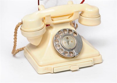 Lot 1010 - A Type 232L Ivory Bakelite Dial Telephone, with chrome dial, drawer to base, original cord, adapted