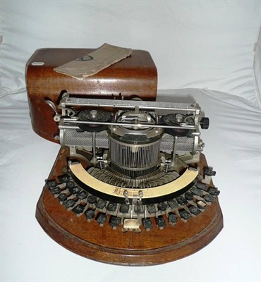 Lot 1016 - A Hammond Model 2 Typewriter, with pre 'querty' keyboard, chrome fittings, wire caged drum, in...