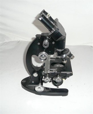 Lot 1022 - A Black Enamelled Binocular Compound Microscope by Cooke, Troughton & Simms, model number...