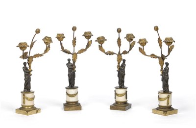 Lot 1189 - A Set of Four Bronze and Ormolu Figural Candelabra, early 19th century, probably French,...