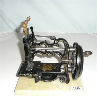 Lot 1043 - A Small Victorian Cast Iron Sewing Machine by Jas.G.Weir, 2 Carlisle Street, Soho, London, ornately