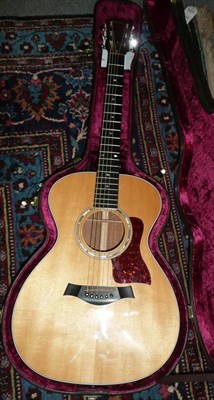 Lot 1085 - A Taylor 512 Acoustic Guitar with EMG Pick-up, serial number 950908104, with Engelmann spruce...