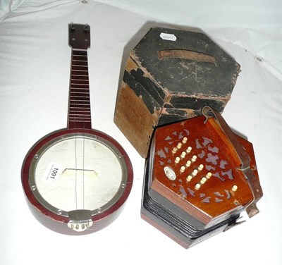 Lot 1091 - A Lachenal & Co., Thirty Key Anglo System Hexagonal Concertina, with mahogany fretwork ends, makers