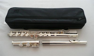 Lot 1093 - A Silver Plated Flute by Trevor James, model number TJ10x11, serial number 21488, in a velvet lined