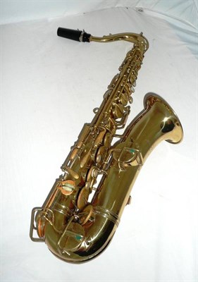 Lot 1097 - A Brass Saxophone by Frank Holton, Elkhorn, serial number C10261LP, with mother of pearl keys...