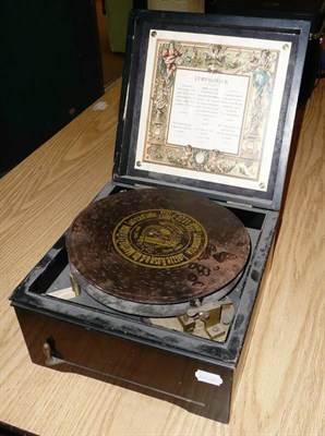 Lot 1101 - A Small Table Top 'Symphonion' Musical Disc Player, with two 10cm steel combs, brass lever...