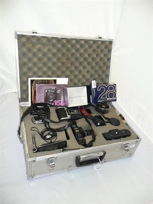 Lot 1125 - A Hassleblad 500C/M Camera Outfit, serial number UE1227029,  with Planar f/2.8 80mm lens,...