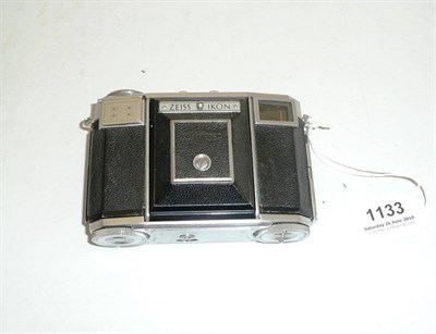 Lot 1133 - A Zeiss Ikon Contessa 35 (533/24) Camera, in chrome, with round rangefinder window directly...